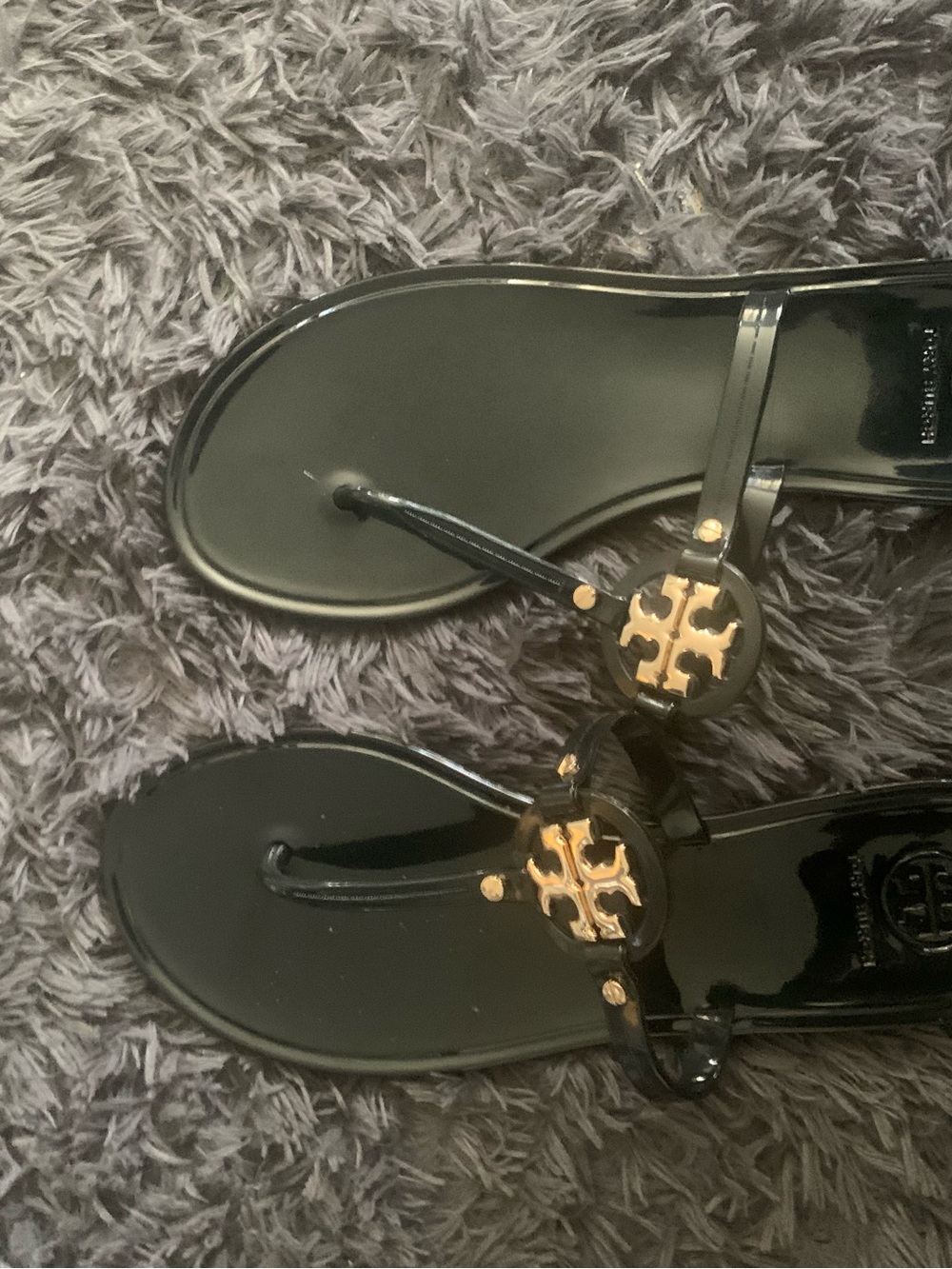 Tory Burch Black Jelly Thong Sandals with Gold Logo Medallion